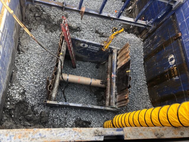 View of the deep excavation with shoring